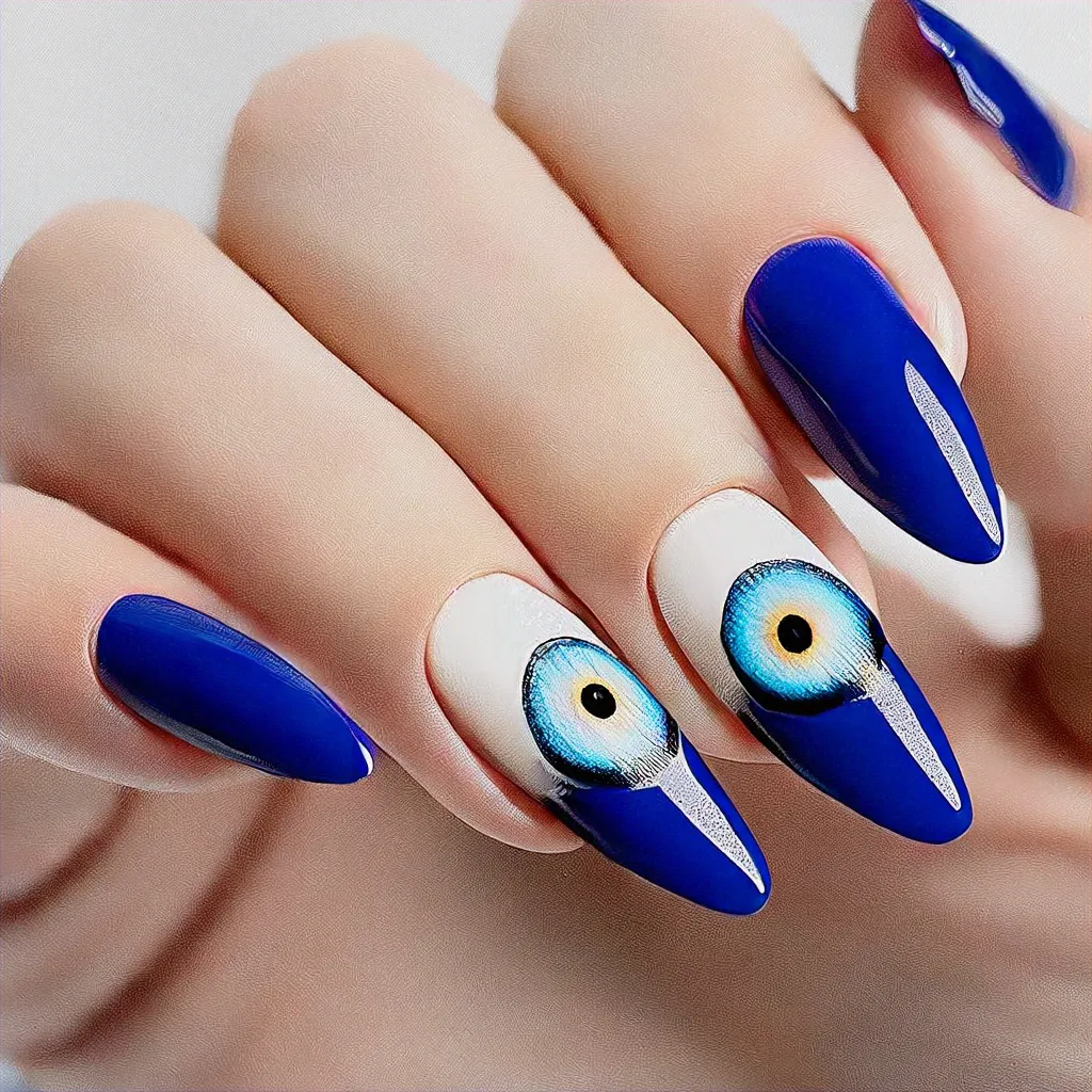 Almond-shaped nails featuring a royal blue ombre evil eye design, perfect for light skin tones and a cruise theme.