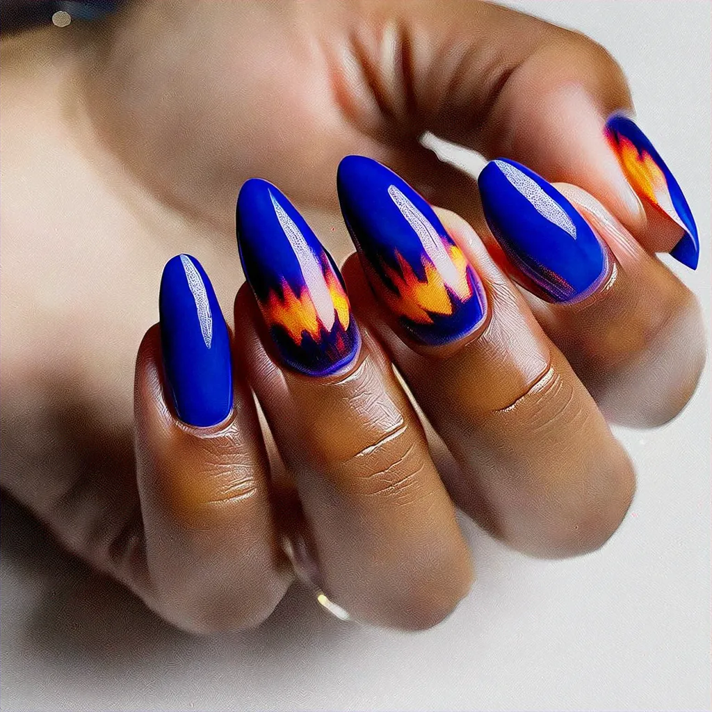 Medium-olive skin showcasing royal blue coffin-shaped nails with a fiery easter-themed powder dip technique.