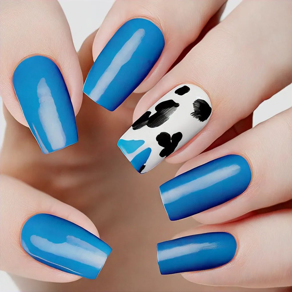 A delightful blue color with a unique cow theme perfect for spring. Suitable for fair skin & oval-shaped nails using airbrush technique.
