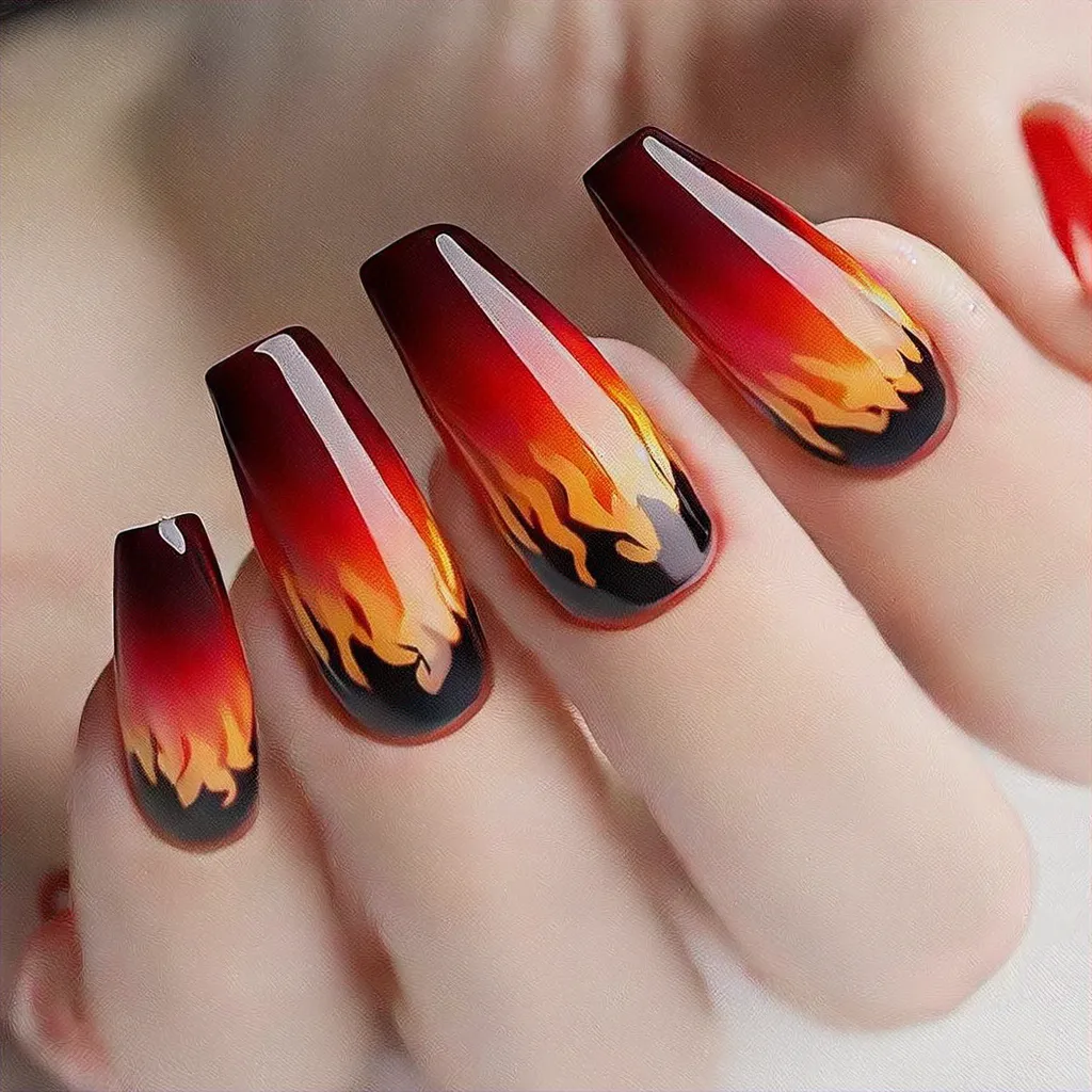 Flaunt your fair skin with fiery, black and red, coffin shaped nails. Opt for a French tip style.