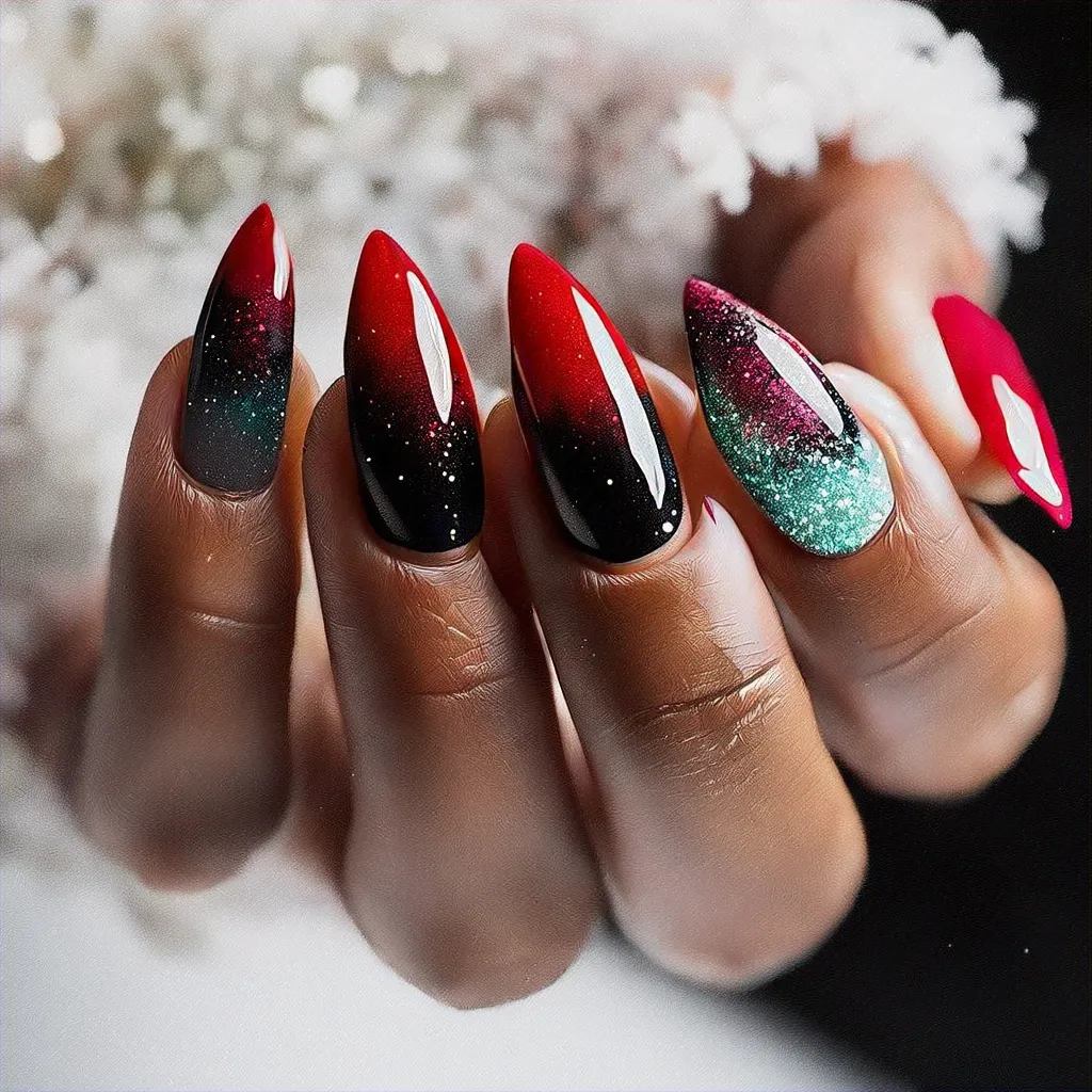 Deep-toned stiletto-shaped nails with a winter theme, boasting black and red foil style ombre dip powder.