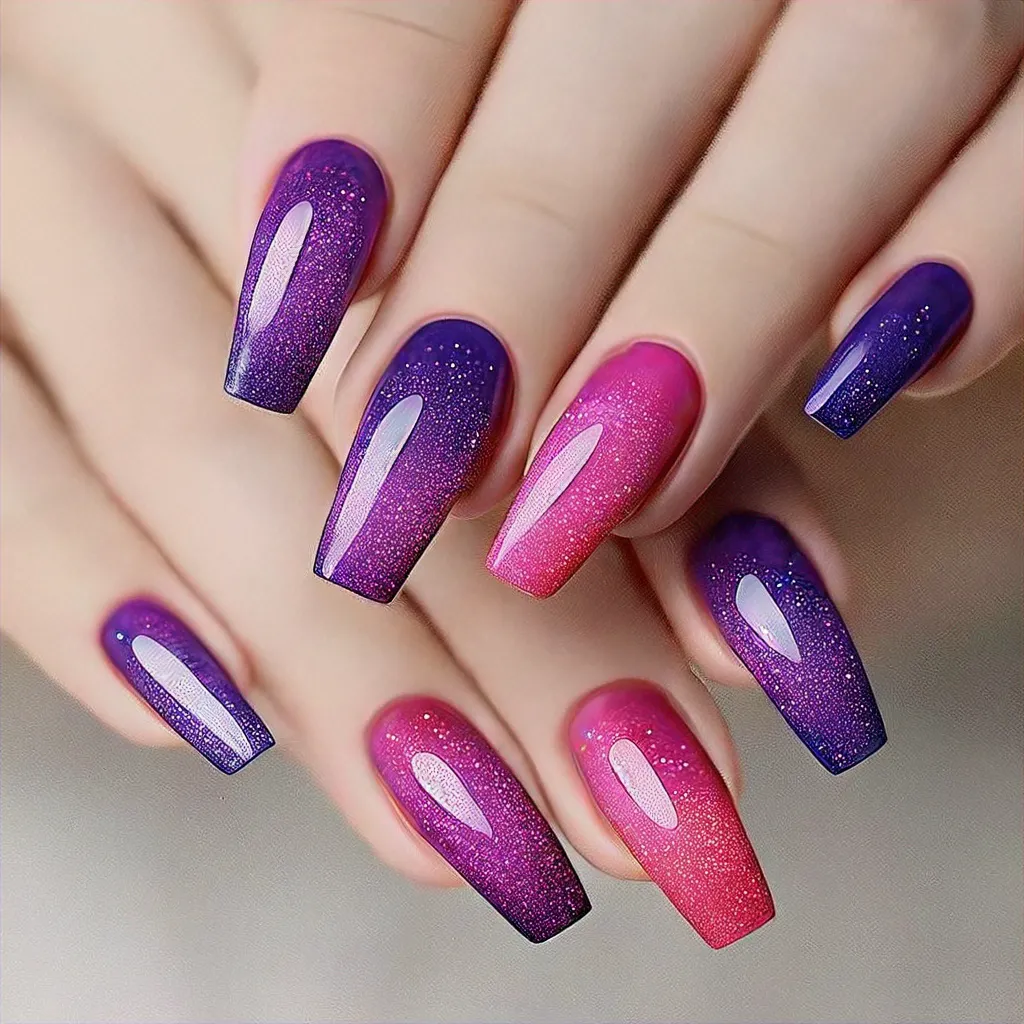 Glamorous pink and purple ombre glitter nails, perfect for vacation. Coffin shape, ideal for fair skin tones.