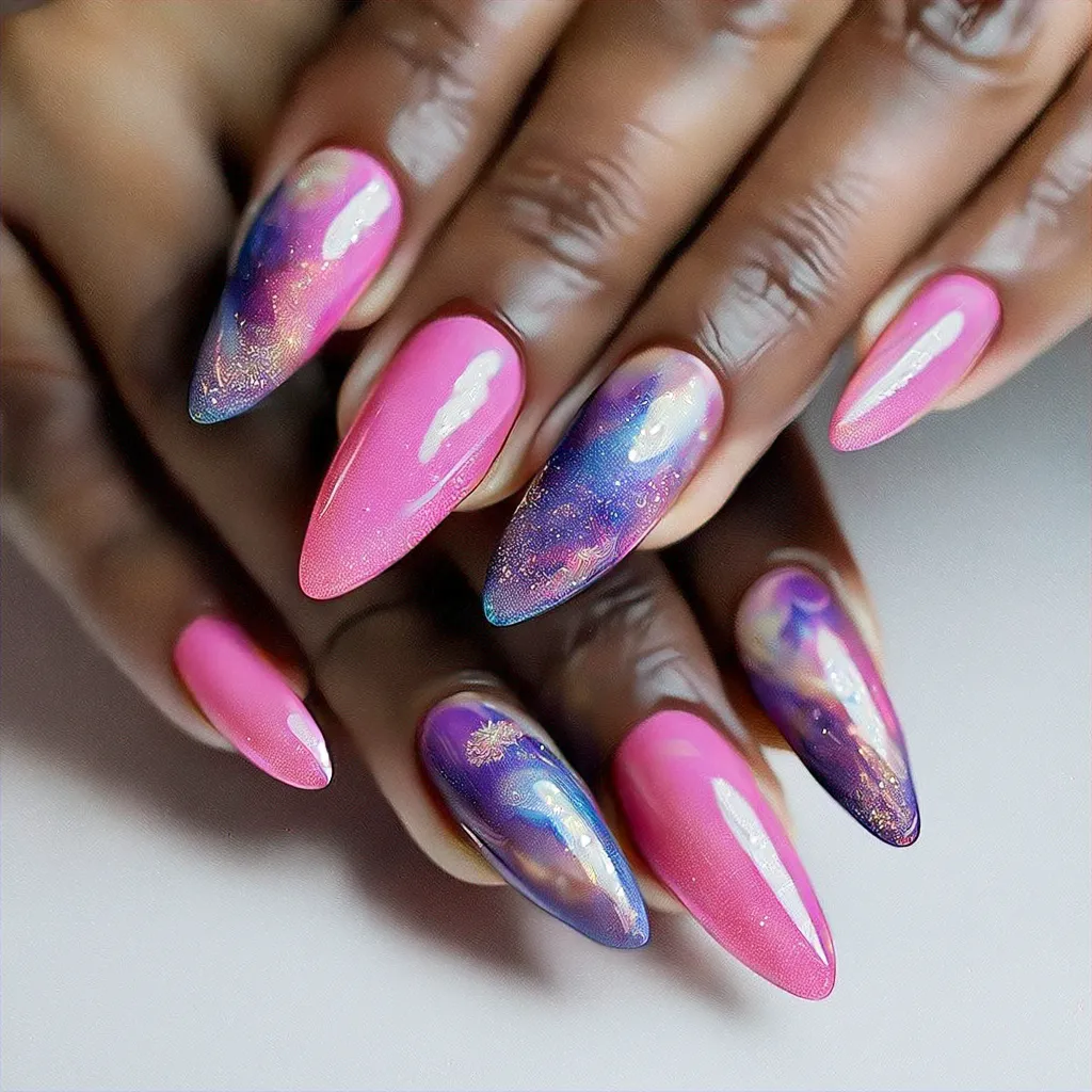 Deep skin tone complements elegantly swirled stiletto nails in pink and purple. Perfect for adding a winter touch.