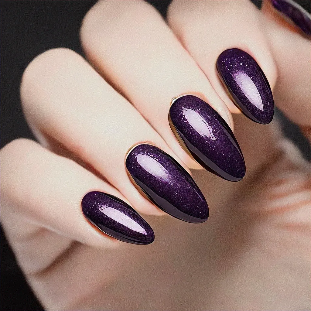Dark purple mermaid style nails on an oval shape, using dip techniques. Perfect for deep skin tones!