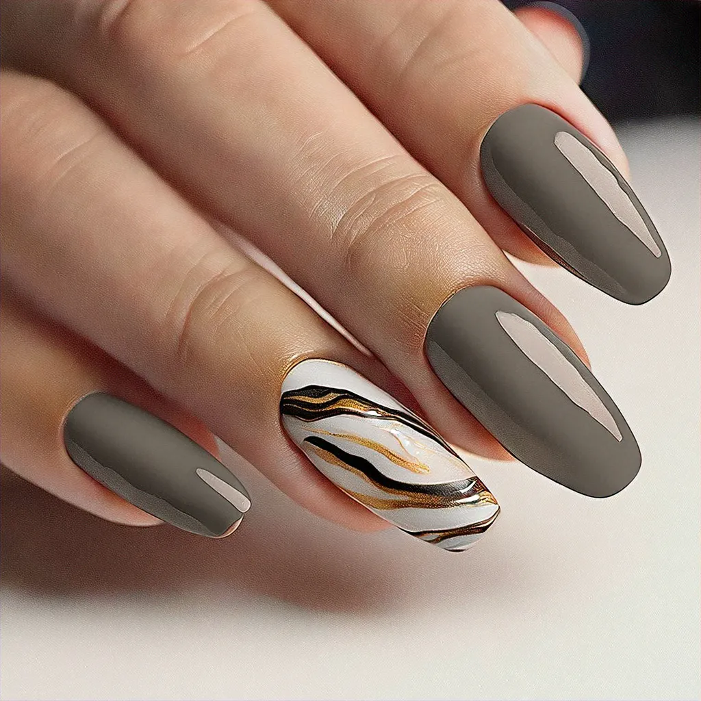 Oval shaped, grey nails crafted into an ugly birthday theme using marble technique for medium-olive skin.