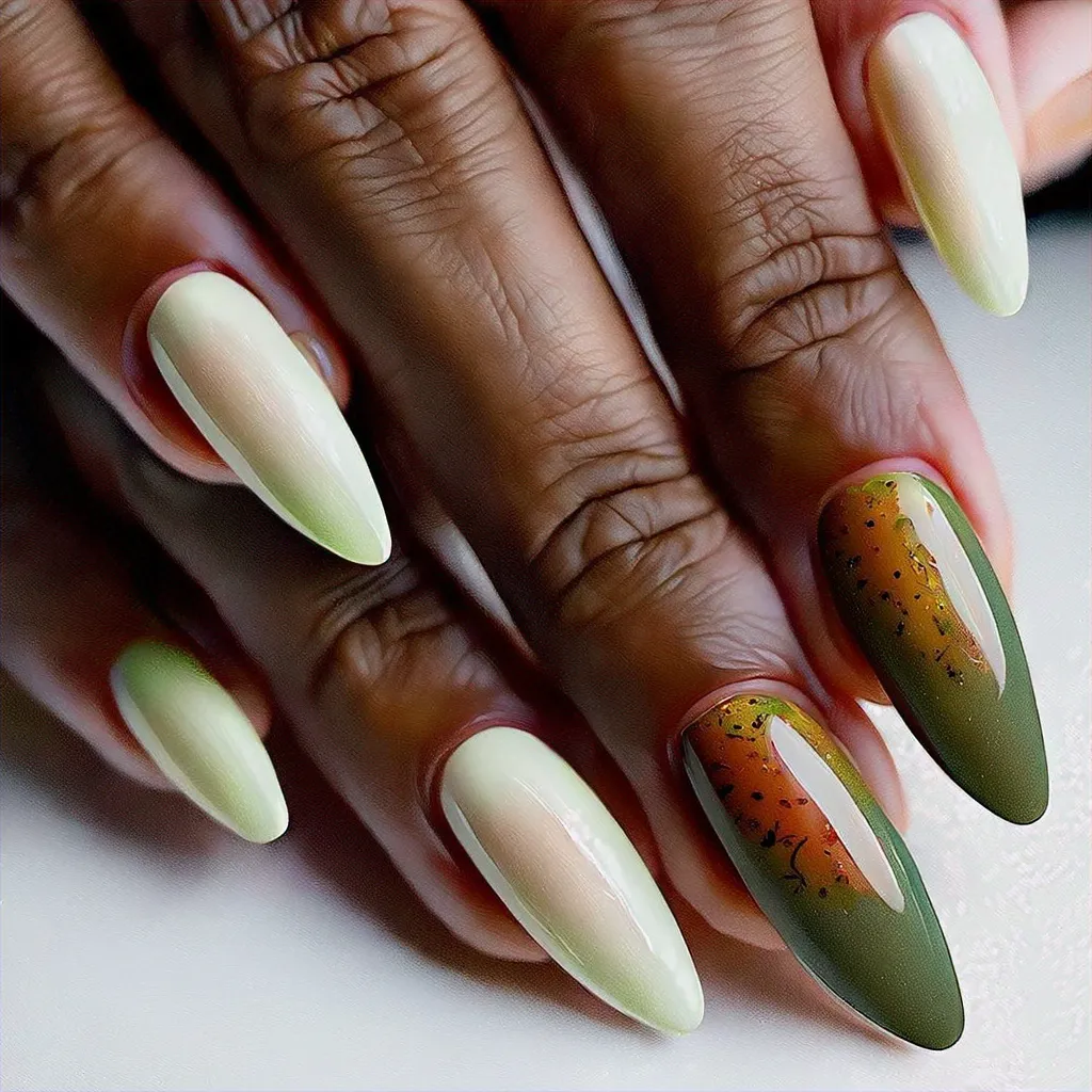 A light green, clear-styled Thanksgiving almond-shaped manicure using ombre dip powder technique for deep skin tones.