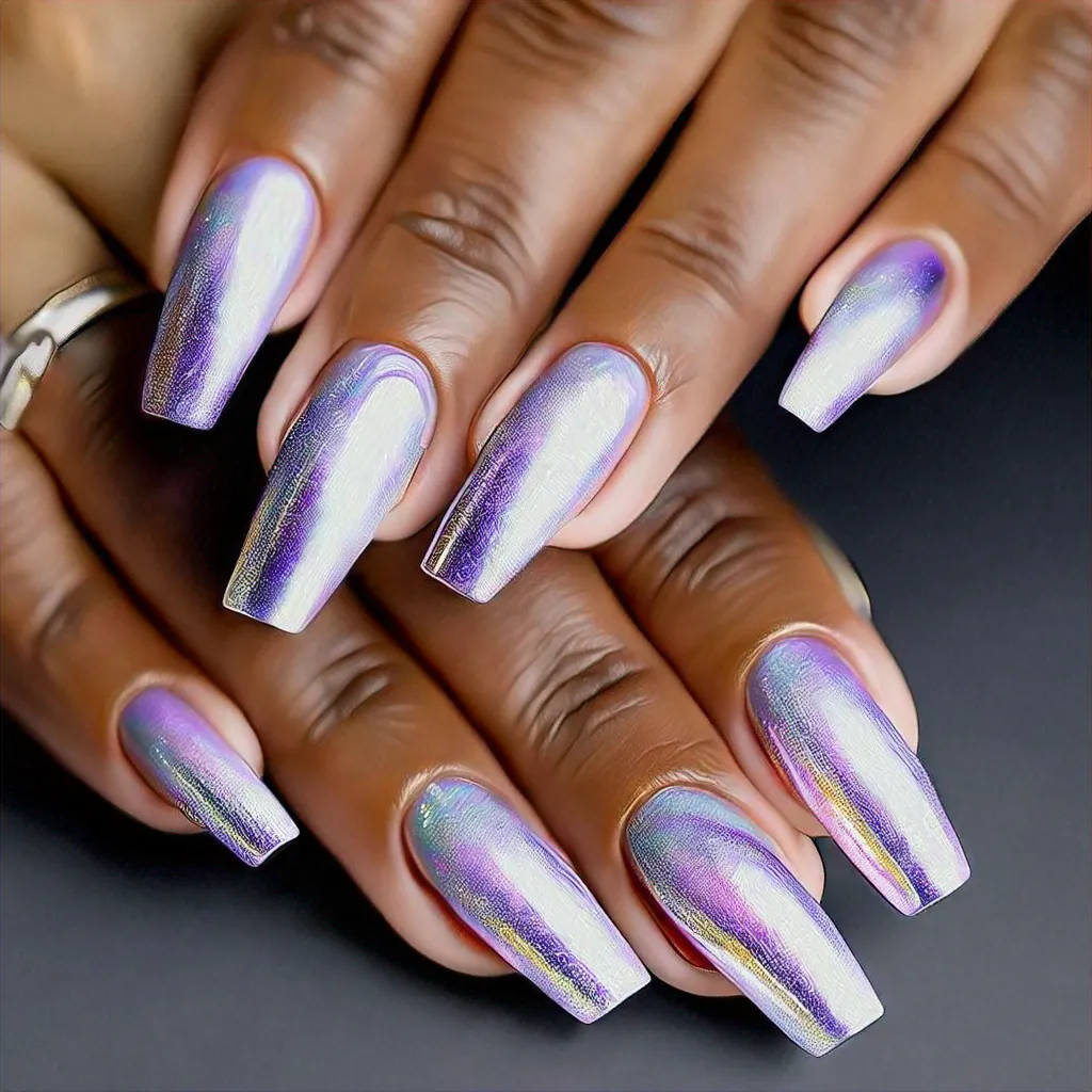 A metallic party-themed nail art with lilac style on a coffin shape, featuring a swirl technique for deep skin tones.