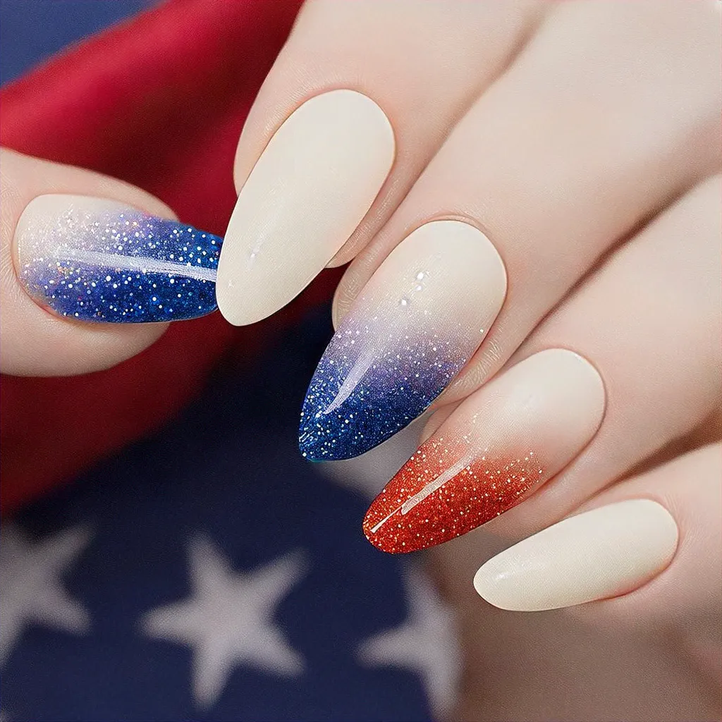 4th of July themed nude almond-shaped nails with a rainbow ombre glitter style suited for fair skin tones.