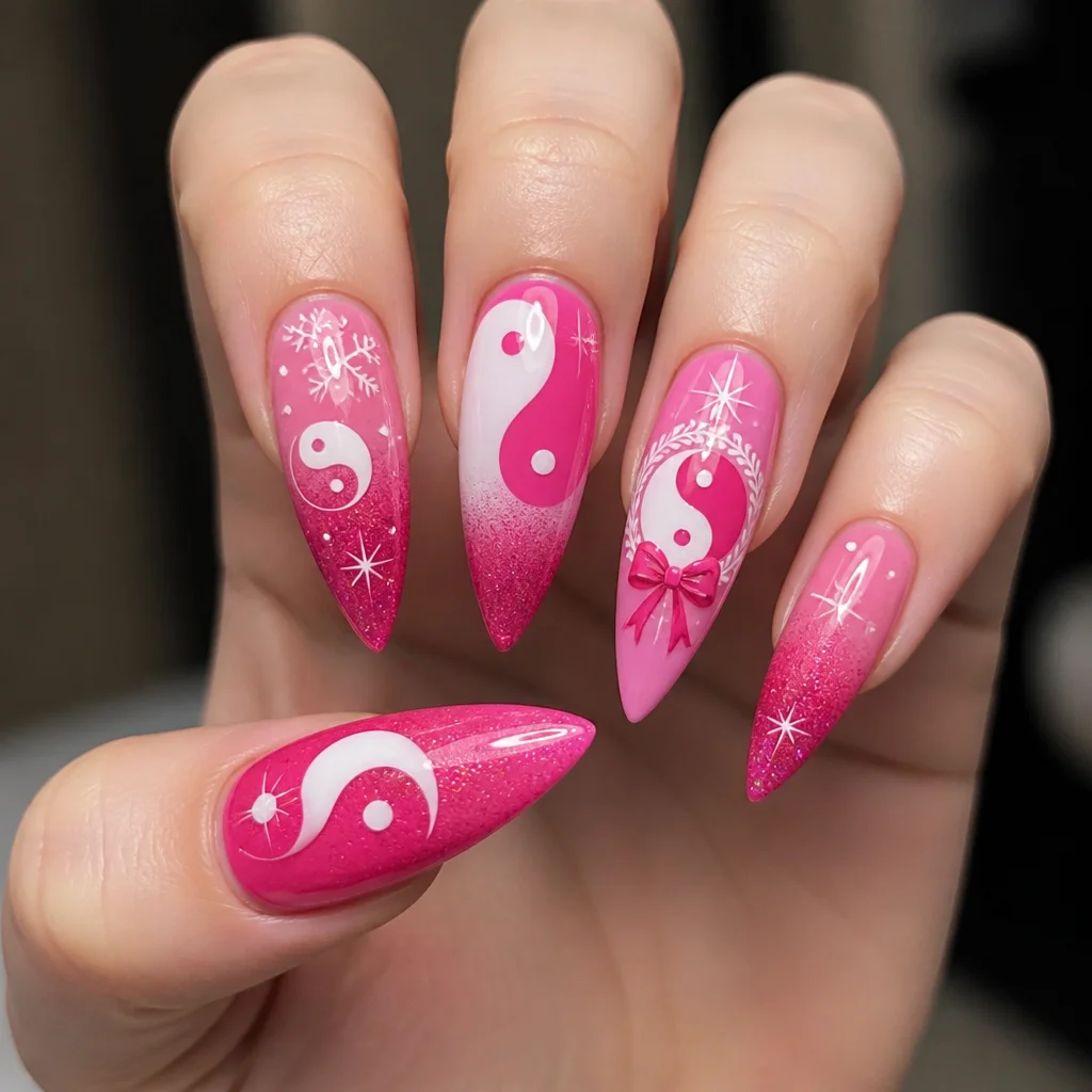 Hot pink stiletto nails, styled in a yin yang Christmas theme, with ombre glitter for fair skin